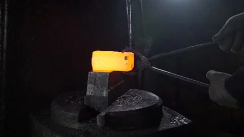 Closeup of Forging Metal Using Pressure Machine Stock Footage 133077812