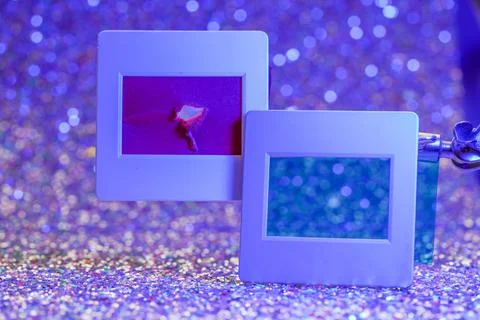 Closeup of frames with glitter and bokeh lights in the background Stock Photos