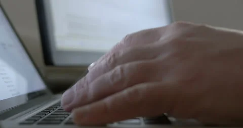 Closeup of freelancer businessman typing on computer keyboard laptop, working Stock Footage 103477159