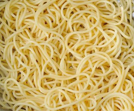 Closeup of freshly boiled spaghetti coiled Stock Photos