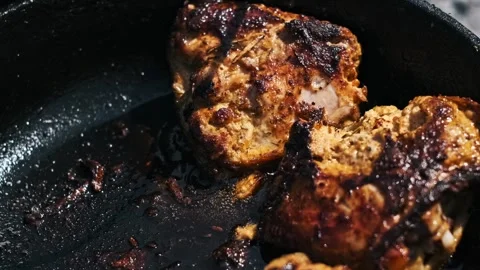 Closeup of Fried Chicken in Pan Stock Footage 284769423