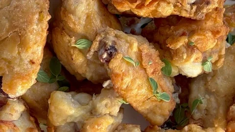Closeup fried chicken wings Stock Footage 220437304