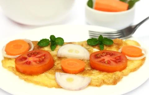 Closeup of fried egg with salad Stock Photos