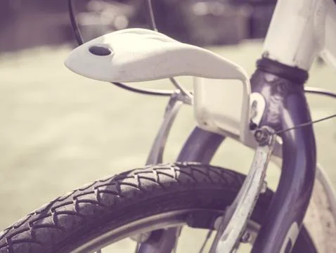 Closeup of a front bicycle wheel selective focus Stock Photos