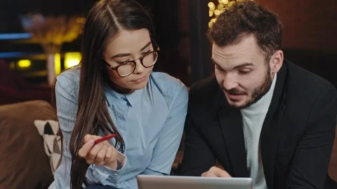 Closeup in front of the camera office manager lady and her office worker Stock Footage 124465655