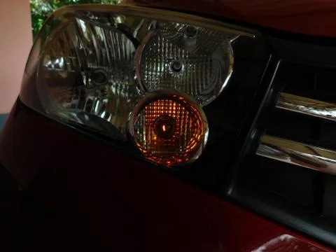 Closeup of Front headlight of a car Stock Photos