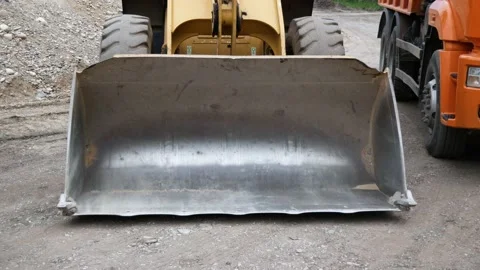 Closeup of front loader bucket on construction site Stock Footage 142661652