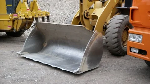 Closeup of front loader bucket on construction site Stock Footage 142661677