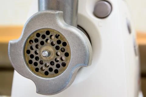 Closeup of front part of meat grinde Stock Photos