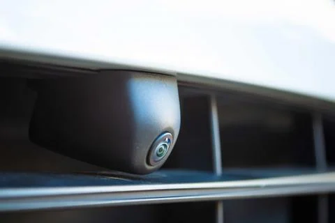 Closeup. Front view camera in the front bumper of the car. Circular 360 degre Stock Photos
