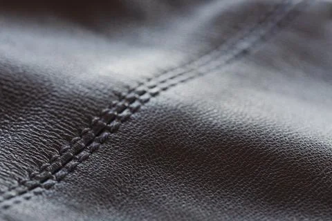 Closeup full grain gray brown leather clothes background Stock Photos