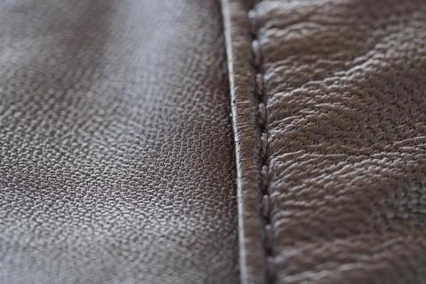 Closeup full grain gray brown leather clothes background Stock Photos