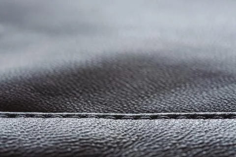 Closeup full grain gray brown leather clothes background Stock Photos