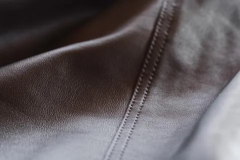 Closeup full grain gray brown leather clothes background Stock Photos
