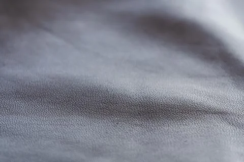 Closeup full grain gray brown leather background Stock Photos