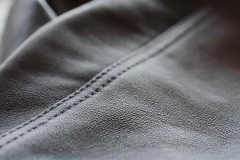 Closeup full grain gray brown leather clothes background Stock Photos