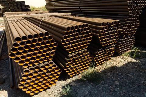 Closeup of galvanized iron pipes stack Foto stock