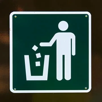 Closeup of a garbage waste on a container Stock Photos