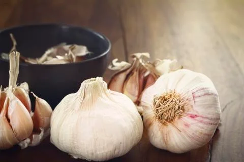 Closeup of gardlic on wood table Stock Photos