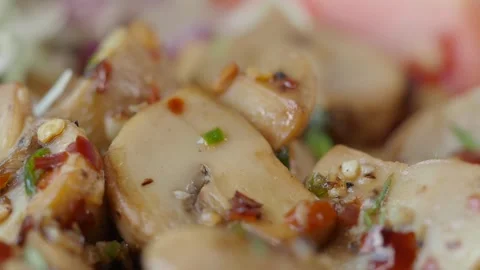 Closeup of garlic mushroom in a plate Video stock 346580359