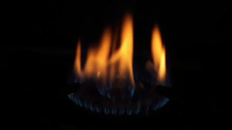 Closeup of gas stove fire texture on black background Stock Footage 292515822