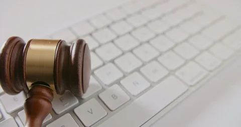 Closeup Of Gavel And Computer Keyboard At Table Stock Footage 92365861