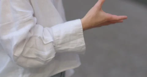 Closeup gesturing hand emphasis, communication, conveying a message. Female Stock Footage 248864551
