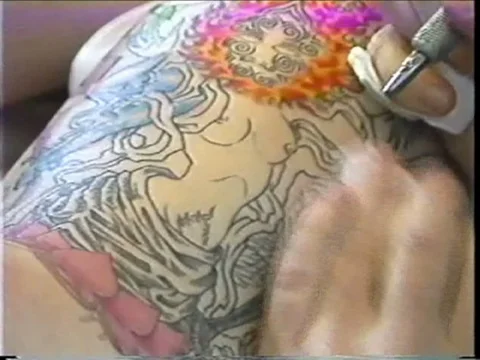 CloseUp Getting Tattoo on Back Stock Footage 69528212
