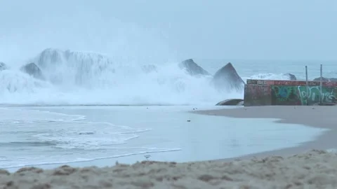 Closeup Giant Waves Crashing On Rocks Beach Graffiti Wall Stock-Footage 211779783