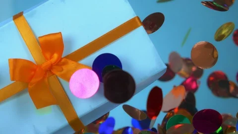 Closeup. gift box and confetti under water. fashion design background. Stock Footage 127387357