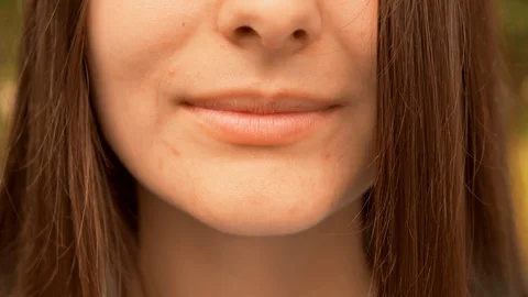 Closeup girl lips smiling Stock Footage 114764253