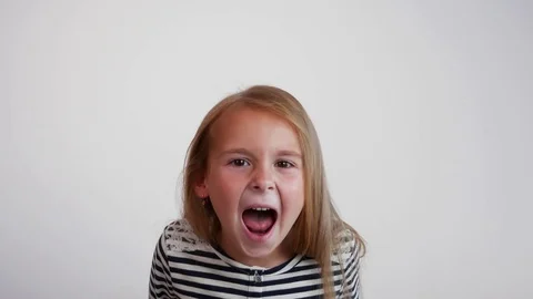 Closeup girl screaming into the camera Video stock 77729443