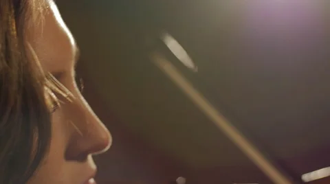 Closeup of girl's face while playing violin Stock Footage 44385850