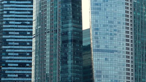 Closeup Glass Facades of Multiple Modern Skyscrapes Stock Footage 114485901