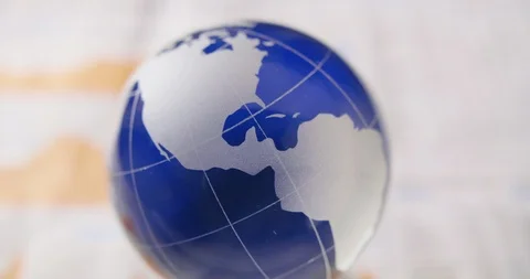 Closeup Of Glass Globe On Table 4K Stock Footage 86084323