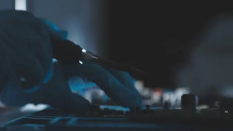 Closeup of a gloved hand installing a microchip on a blue motherboard. Perf.. Stock Footage 341547554