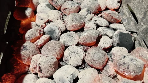 Closeup of glowing charcoal covered with ash in a barbecue or fire pit. Stock Footage 341774558