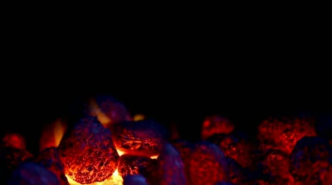 Closeup of glowing coal with some flames Video stock 41068710