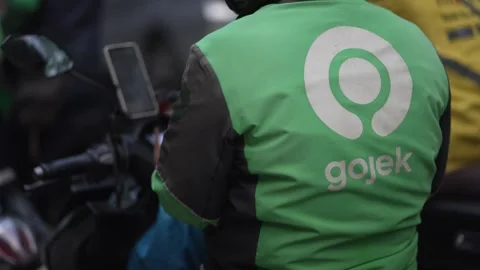 Closeup up of Gojek driver waiting for passanger Stock Footage 252628812