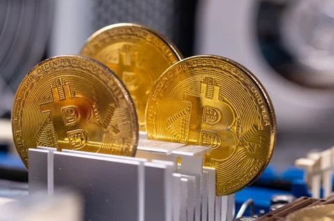 Closeup of gold bitcoin on computer components background, technology and d.. 写真素材