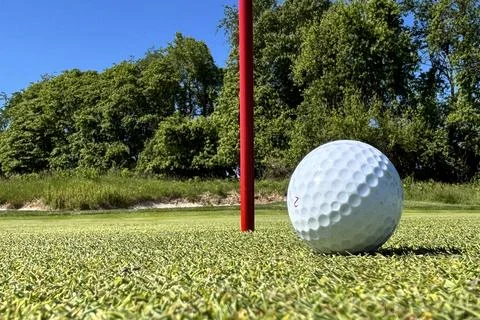 Closeup of Golf Ball Hole Stock Photos