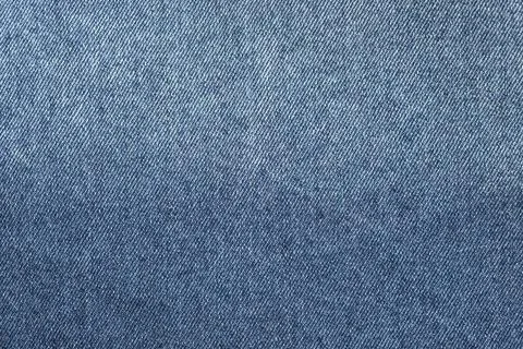 Closeup to a gradient Blue jean texture 스톡 사진