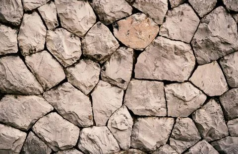 Closeup granite walls arranged in a pattern abstract. Stock Photos