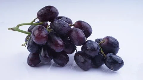 Closeup of Grapes on a white background.  Stock Photos