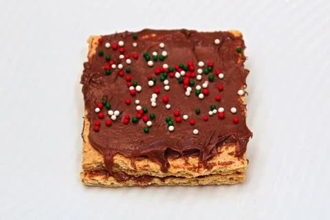 Closeup of grapham crackers spread with chocolate and sprinkles Stock Photos