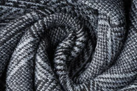 Closeup gray texture of woolen knitted fabric. Pattern of gray crumpled fabri Stock Photos