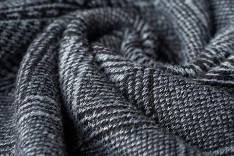 Closeup gray texture of woolen knitted fabric. Pattern of gray crumpled fabri Stock Photos