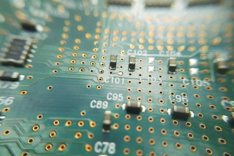 Closeup green computer PCB board. Macro picture of green printed circuit boar Stock Photos