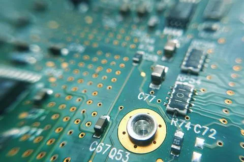 Closeup green computer PCB board. Macro picture of green printed circuit boar Stock Photos