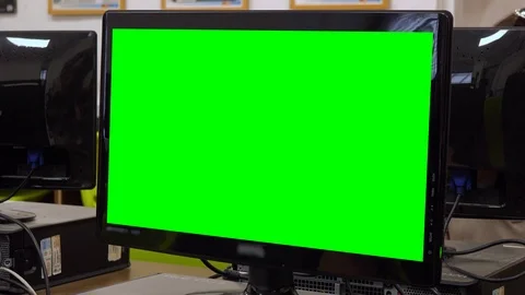 Closeup on a green computer screen in a high school classroom Vídeo Stock 92408890